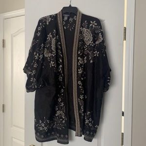 Black Kimono with embroidered flowers.